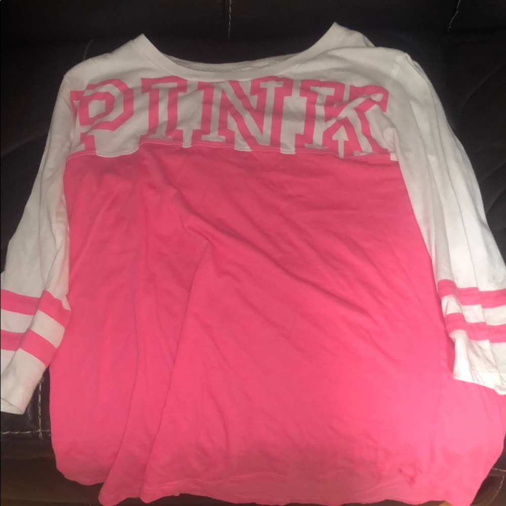 A pink and white brand pink shirt